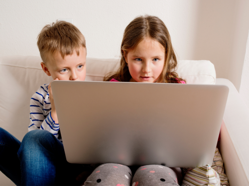 children watching laptop