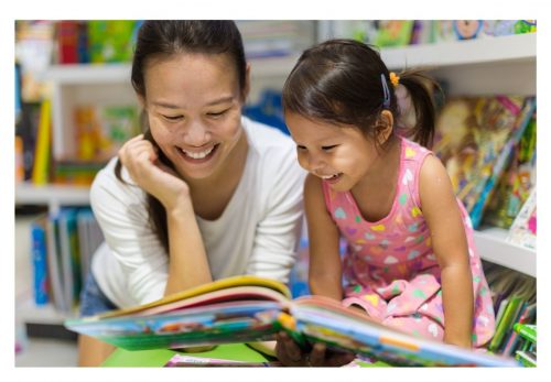 Mother Reading With Deaf Child