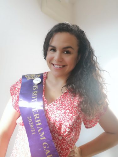 Deaf Pageant Ashleigh in a purple sash