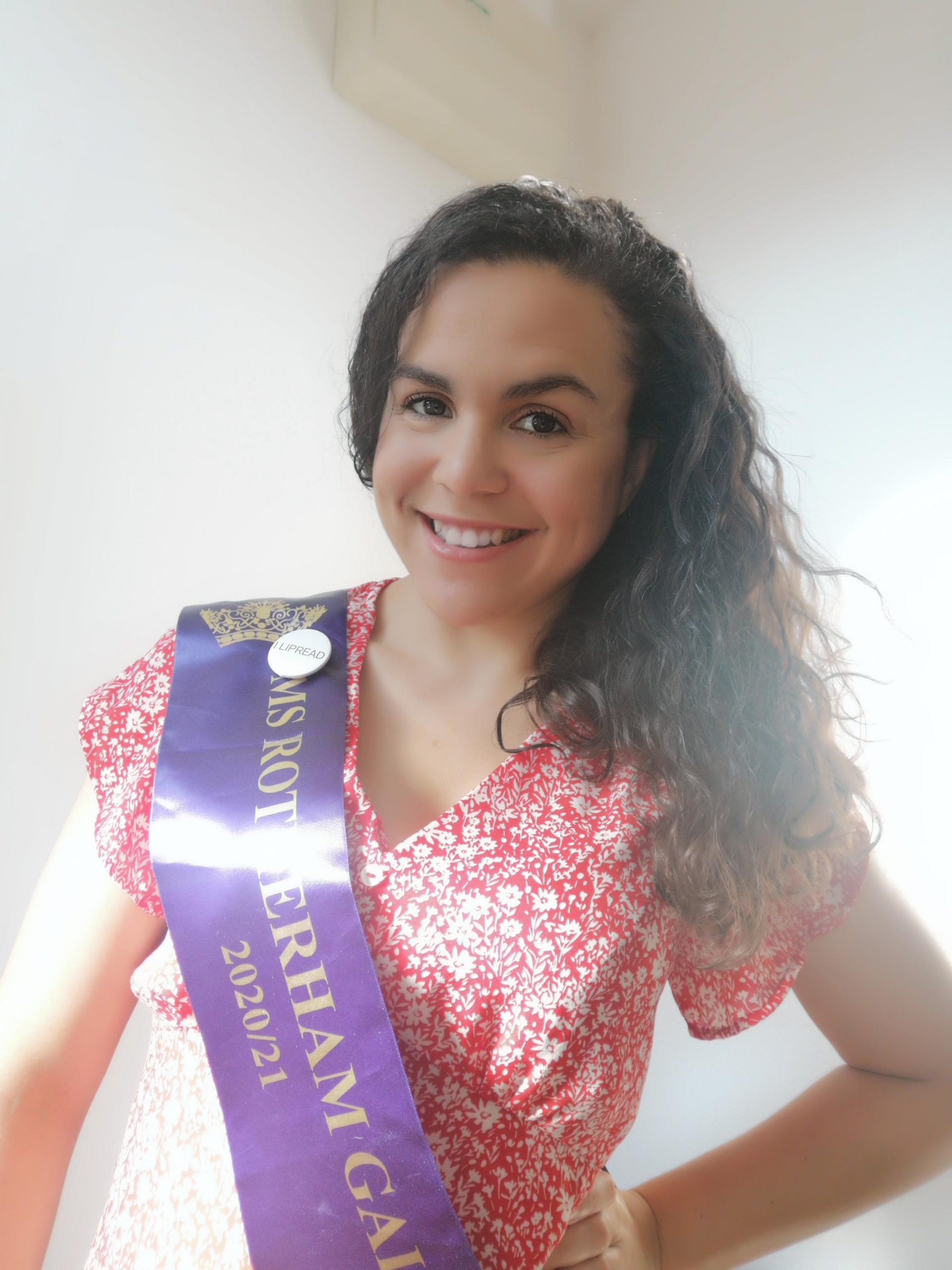 Deaf Pageant Ashleigh in a purple sash | Deaf Unity