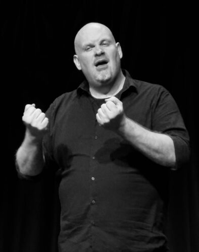 black and white image of Gavin performing
